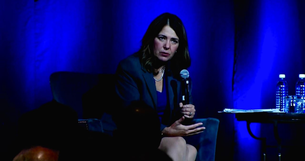 Alberta Premier Danielle Smith speaking at an event in Calgary