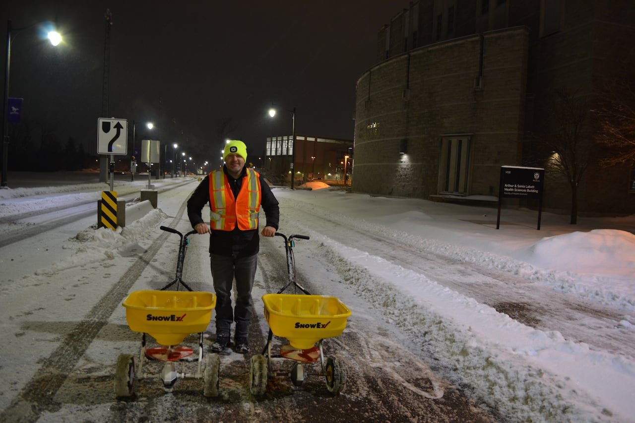 Christopher Power, an associate professor at Western University, conducting experiments with various de-icing compounds on campus.