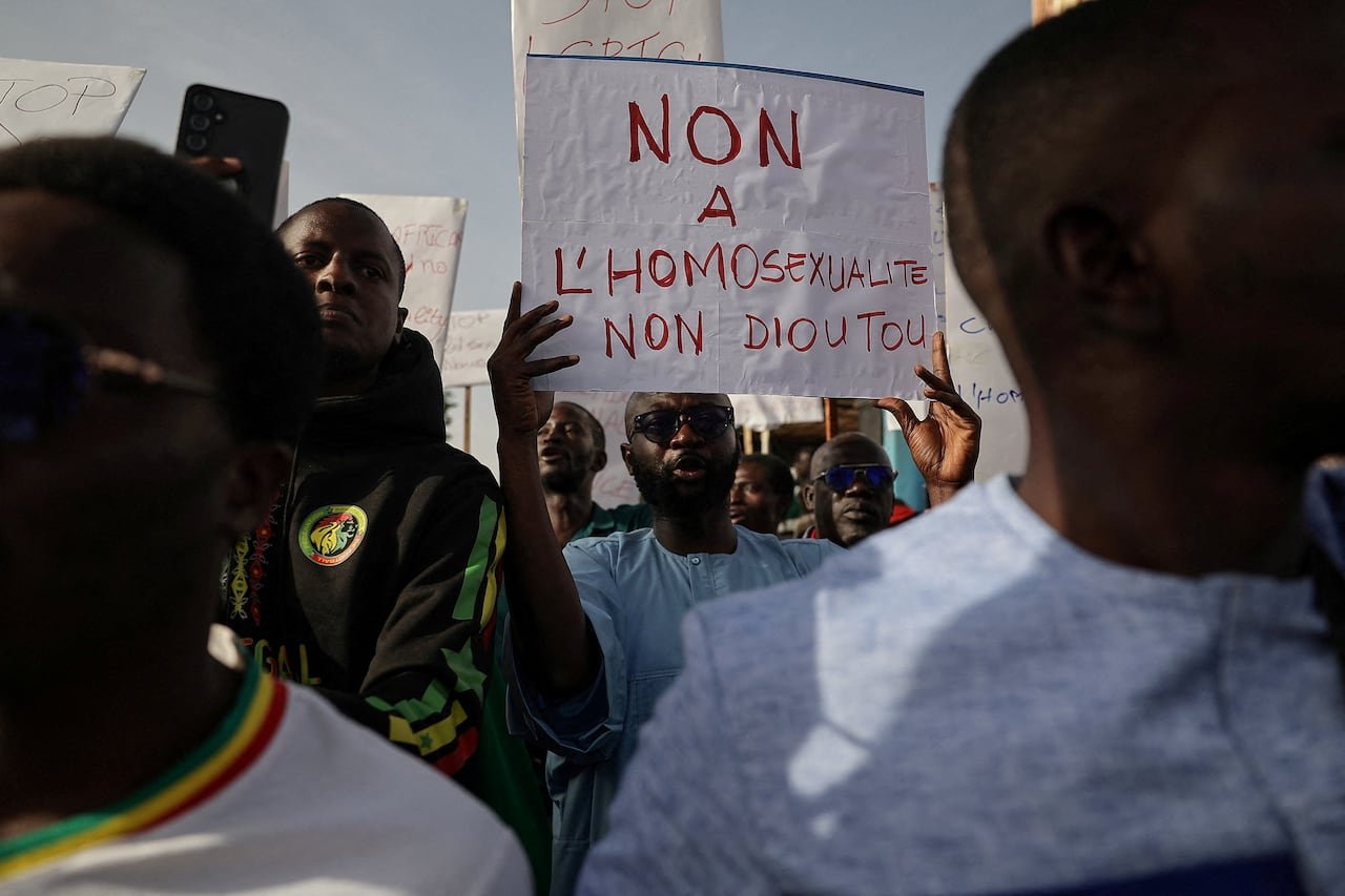 People holding signs