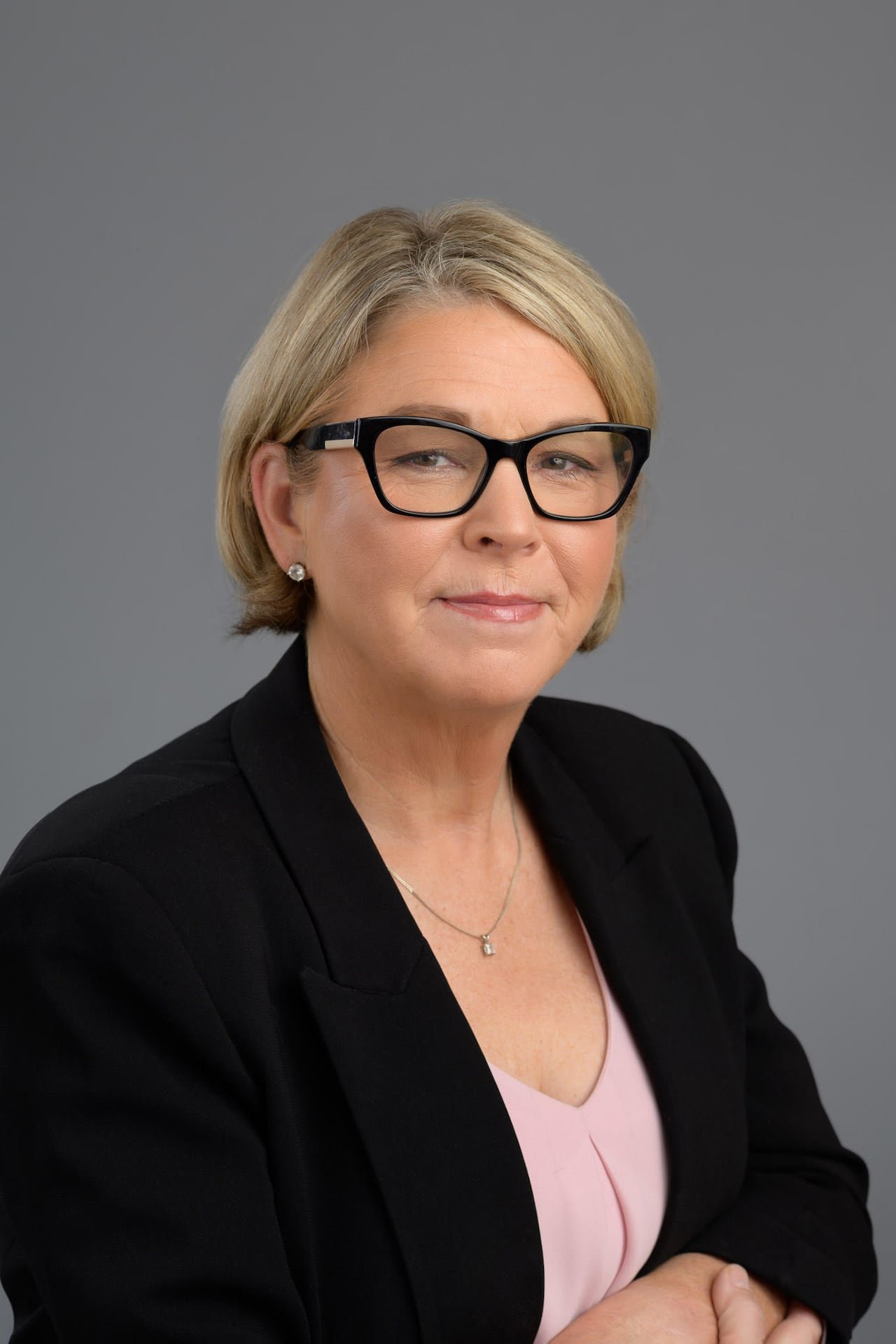 A woman wearing glasses