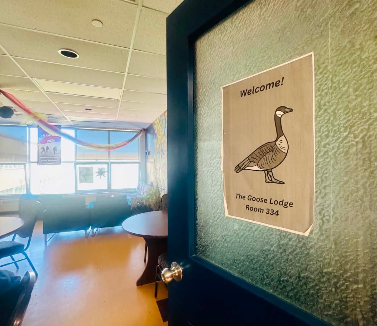 default-49 A door with 'Goose Lodge' sign